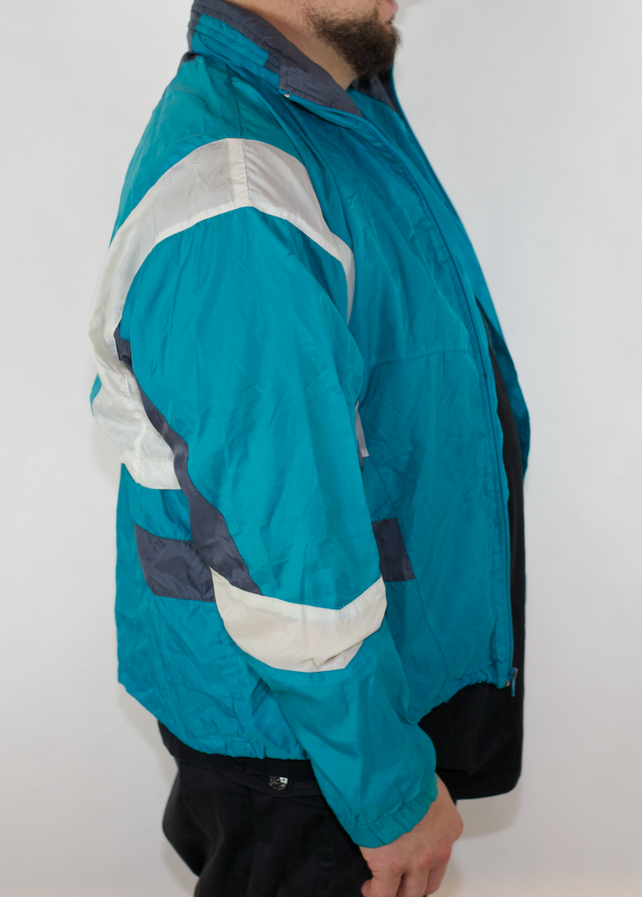 VINTAGE NIKE TEAL WHITE GREY SPRAY JACKET (TAGGED FADED FITS M-L)