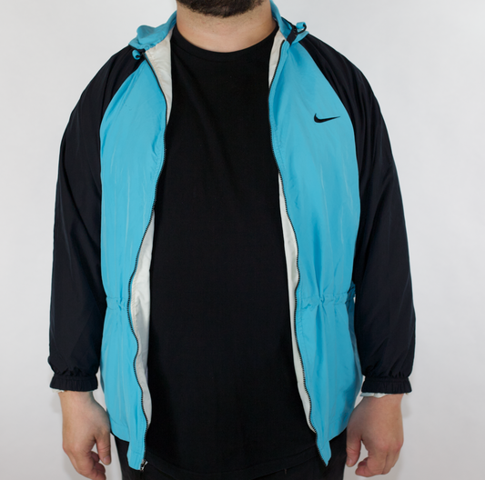 VINTAGE NIKE TEAL BLACK SPRAY JACKET (12-14 L FITS LARGE)